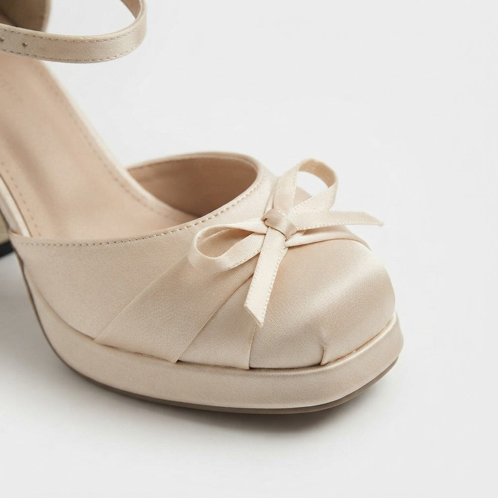 The Pretty Please Bow Platform Heels